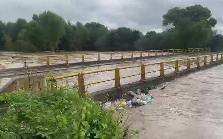 Niveles del río Florido sobrepasan puente en Villa Coronado